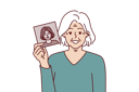 پیش‌نمایش فایل elderly-gray-haired-woman-shows-own-old-photo-10598409 از پک فعالیت افراد