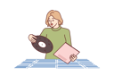 پیش‌نمایش فایل woman-chooses-vinyl-record-for-music-play-10950223 از پک فعالیت افراد