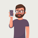 پیش‌نمایش فایل man-in-glasses-with-beard-is-showing-the-phone-1710461 از پک شخصیت تاجر هیپستر با ریش
